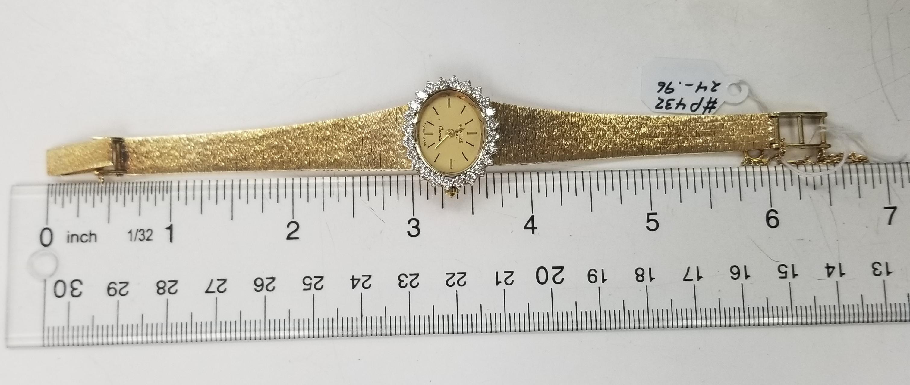 Geneve 14k yellow gold Swiss diamond watch with mesh band, containing 24 round full cut diamonds of very fine quality weighing 1.03cts.  The watch is about 6 inches and has 2 settings with a safety chain.  The Watch has a brand new movement.
 *We