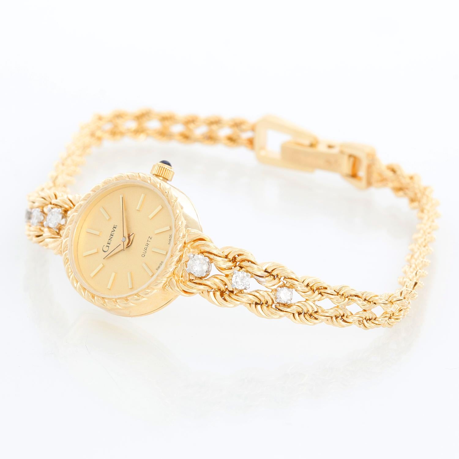 Geneve Classic 14K Yellow Gold Ladies Watch - Quartz. 14K Yellow gold case ( 17 mm ). Champagne textured dial with stick hour markers. Two row bracelet with diamonds; will fit a 6.5 inch wrist. Pre-owned with custom box.