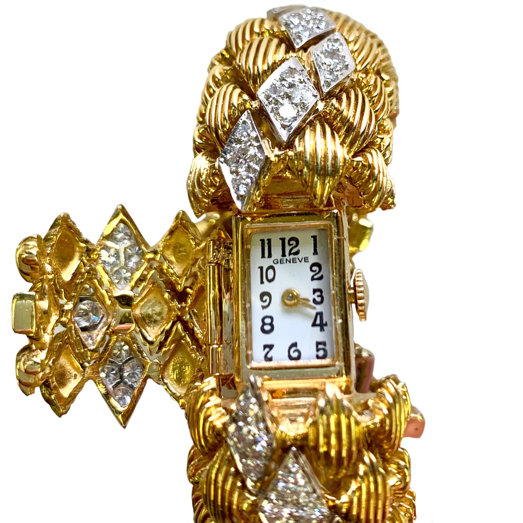 Stunning 14K yellow and white gold flexible bangle vintage Geneve cover watch circa 1960's.  It has a P. Buhre 17 jewel Swiss movement and is set with 119 brilliant cut diamonds with a total weight of approximately 3.74cts. several are chipped. The