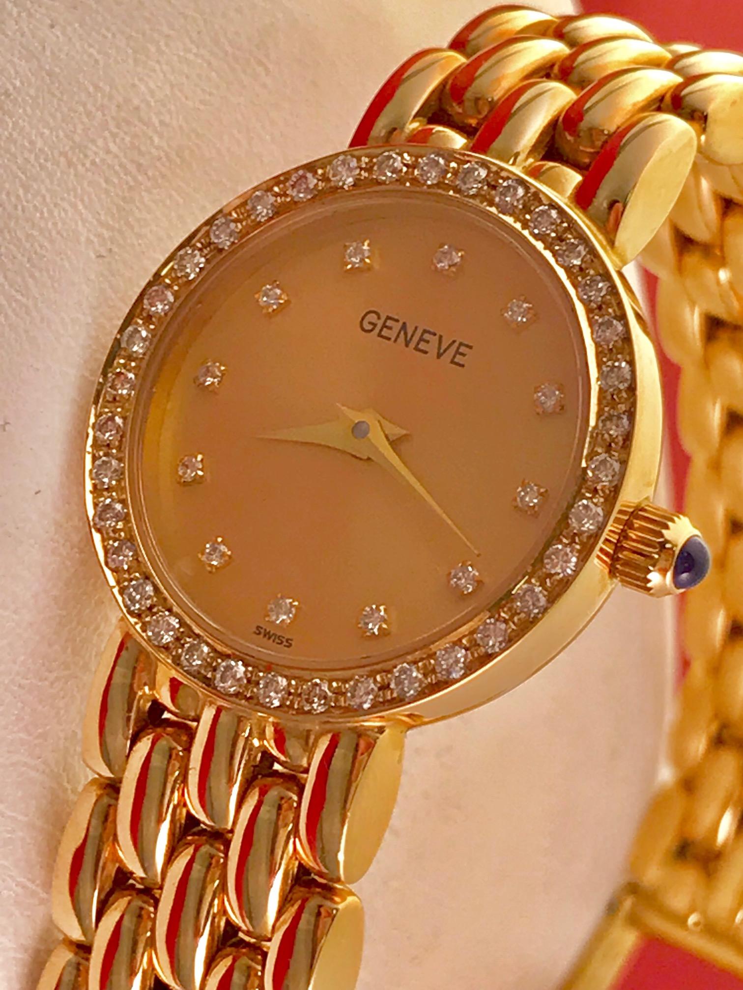 Genève Ladies wrist watch in 14k yellow gold with diamond bezel. This Gevève Ladies wrist watch has an all 14k gold bracelet with full links and hidden deployant clasp. Powered by a Swiss quartz movement. This watch is in 
