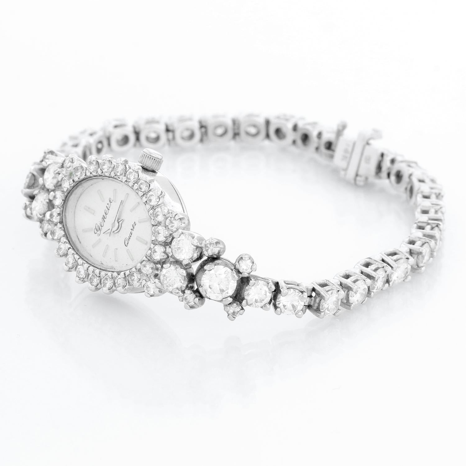 Geneve Vintage Diamond 14K White Gold Ladies Watch - Quartz . 14K White Gold (15 x 27 mm). Silver dial with silver raised baton markers. Diamond Tennis bracelet; will fit up to a 5 1/2 inch wrist . Pre-owned with custom box.