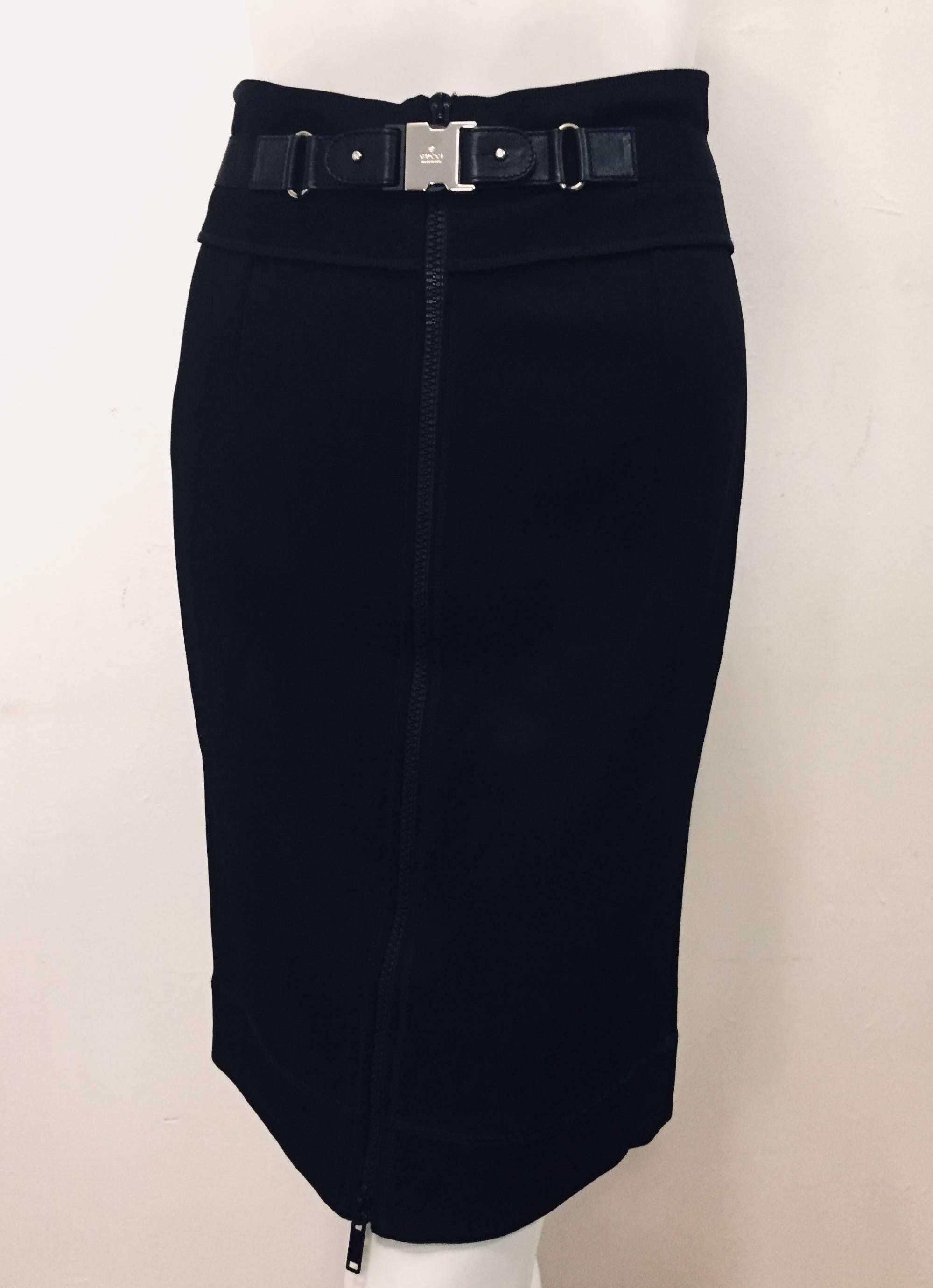 Gucci black silk blend pencil skirt with elasthane for added stretch and comfort. This Gucci trendy pencil skirt features a waist to hem black plastic zipper and slider.    The hem and zipper has bold top stitching around them for added flare.  The