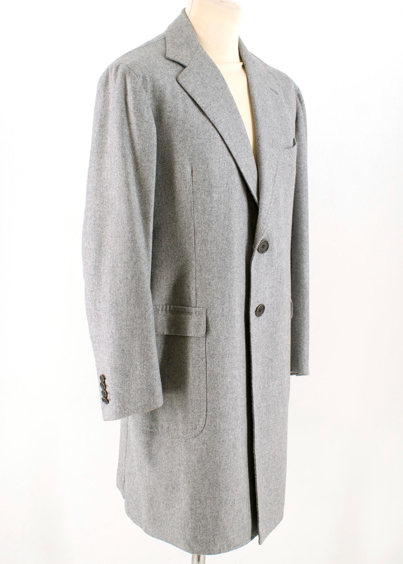 Gennano Solito High-quality luxurious Grey Long Coat

- Luxurious long Cashmere coat finely hand-made in Italy
- Light-weight coat with two front pockets (one on each side)
- Soft inside pockets with hand-stitched embroidery on the right side if the