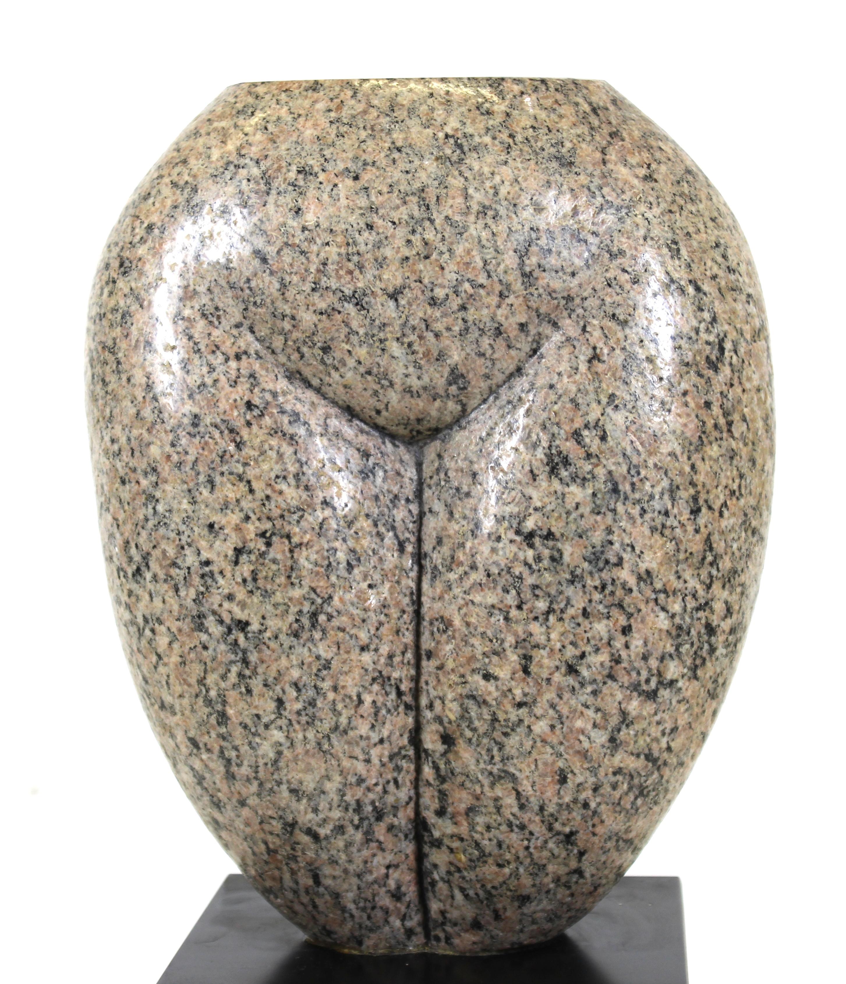 Mid-Century Modern 'Torso' direct carving in granite of a woman's torso, by A. Gennarelli. The piece is mounted atop a square stone base which bears a plaque with the artist name and title, as well as the artist incised signature on the top of the