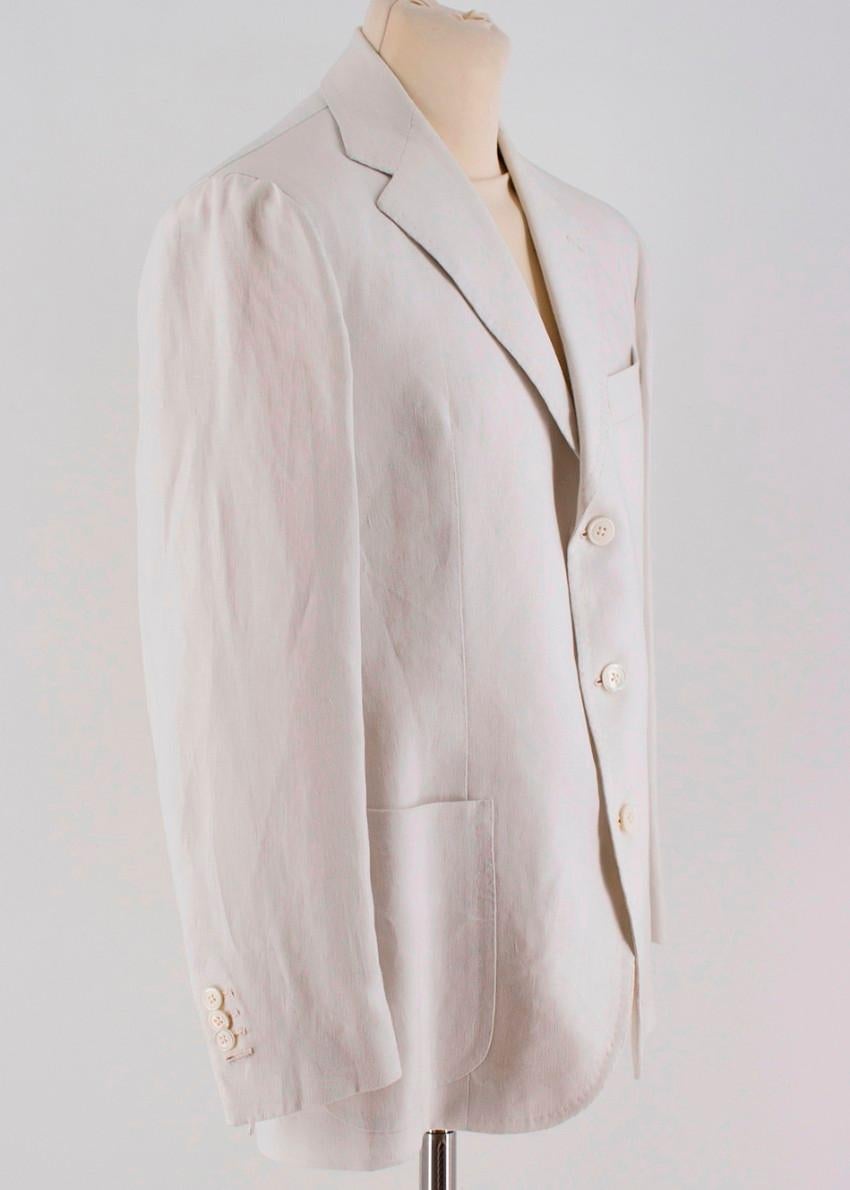 Gennaro Solito Napoli Bespoke Off-white Jacket and Trousers Set

Jacket 
- Off-white Blazer Jacket 
- Peak lapel, single breasted 
- Buttoned sleeves 
- Dual front side pockets, single chest pocket 
- Partially lined 

Trousers
- Off-white suit