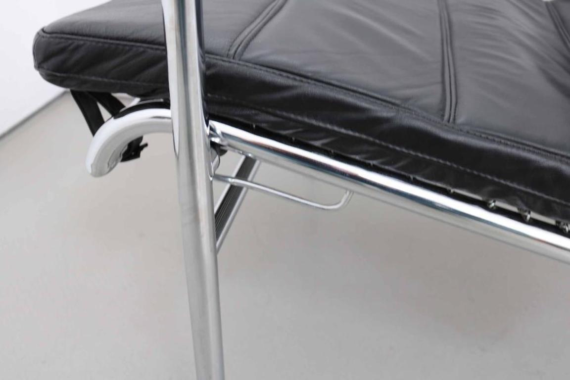 Leather Genni Chaise or Lounge Chair + Stool by Gabriele Mucchi in black leather chrome For Sale