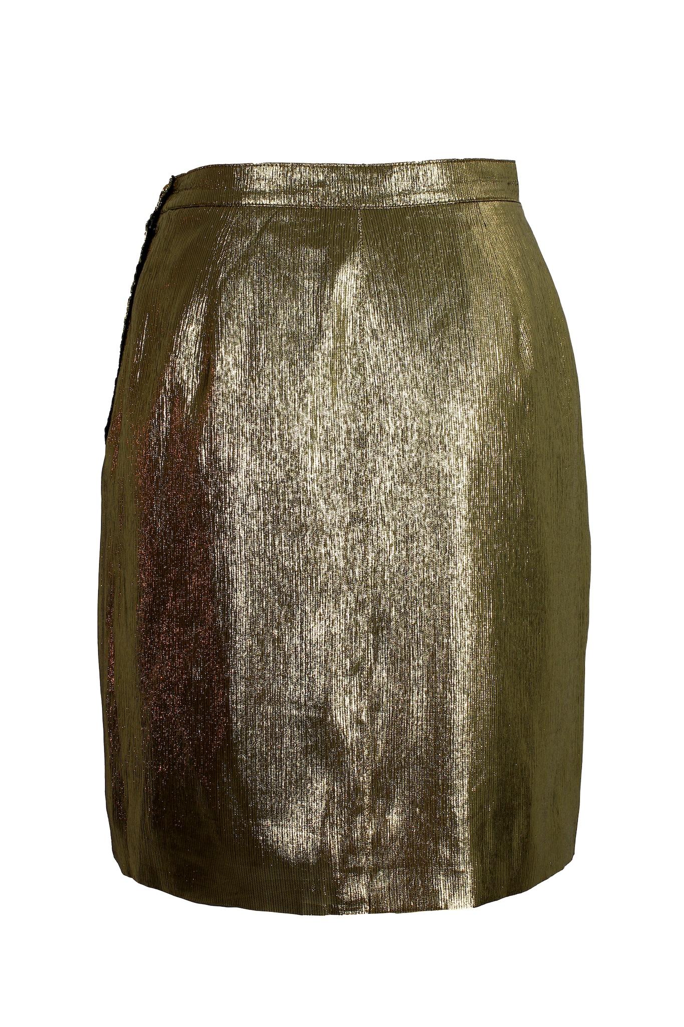 Genny elegant vintage 80s skirt. Short skirt on the knee, sheath model, gold color, 74% silk, 26% lurex fabric. Made in italy.

Size: 40 It 6 Us 8 Uk

Waist: 31 cm
Length: 50 cm