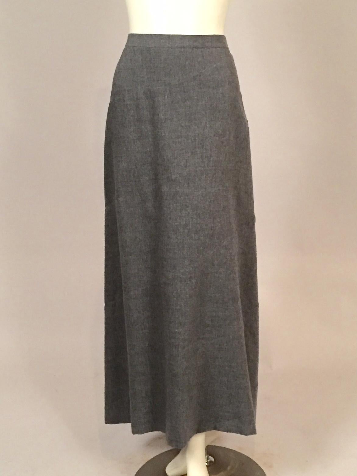 Sleek and elegant this skirt can be dressed up with heels or dressed down with boots for many different occasions and different looks. The cashmere is seamed on the bias creating a spiral seam around the wearer. The skirt is fully lined. The natural