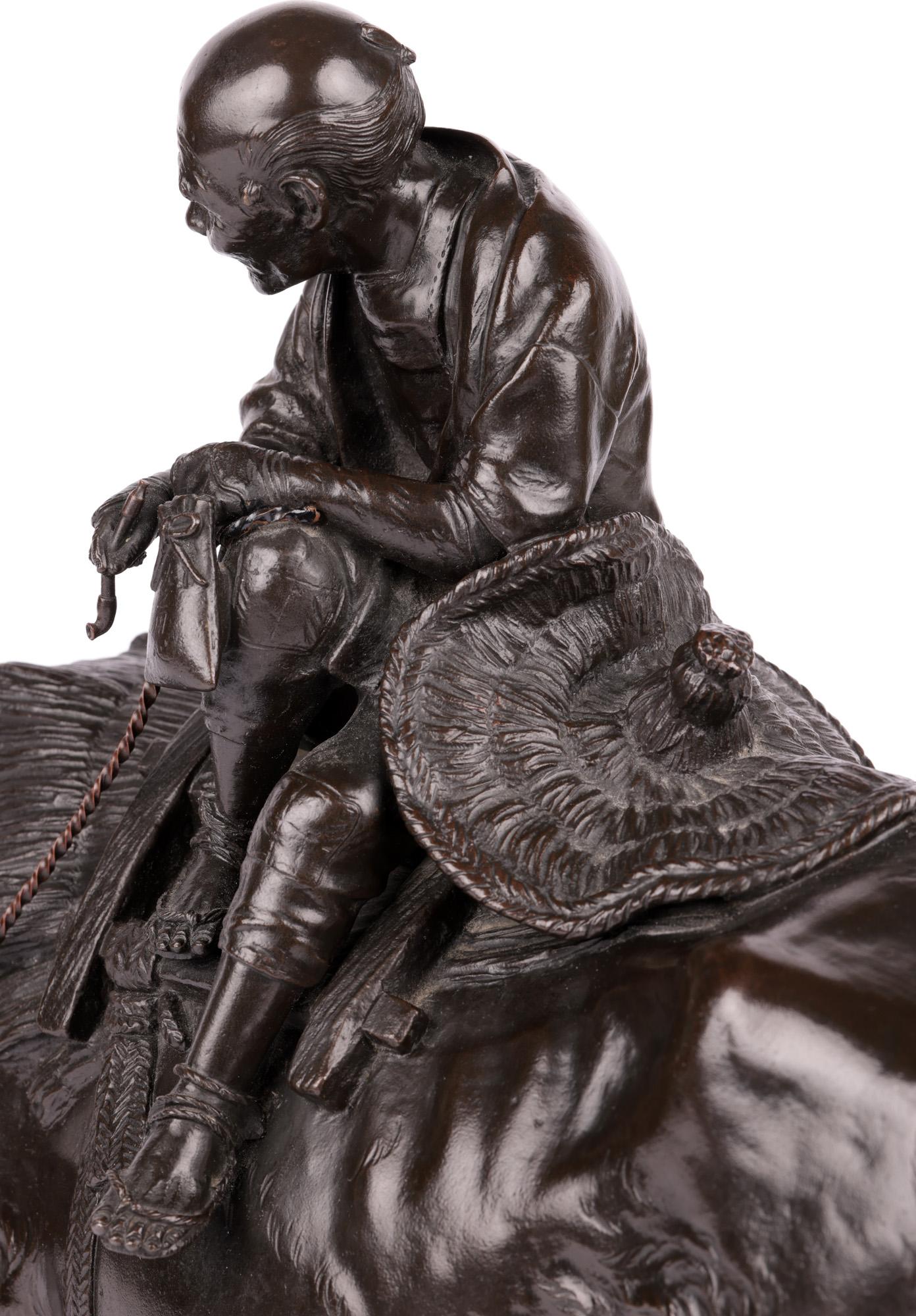 Genryusai Seiya Escultura japonesa Meiji de hombre y búfalo de agua sobre peana en venta 10