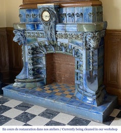 GENTIL & BOURDET " Model K ", blue stoneware mantel with lions heads