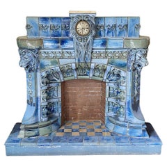 GENTIL & BOURDET " Model K ", blue stoneware mantel with lions heads