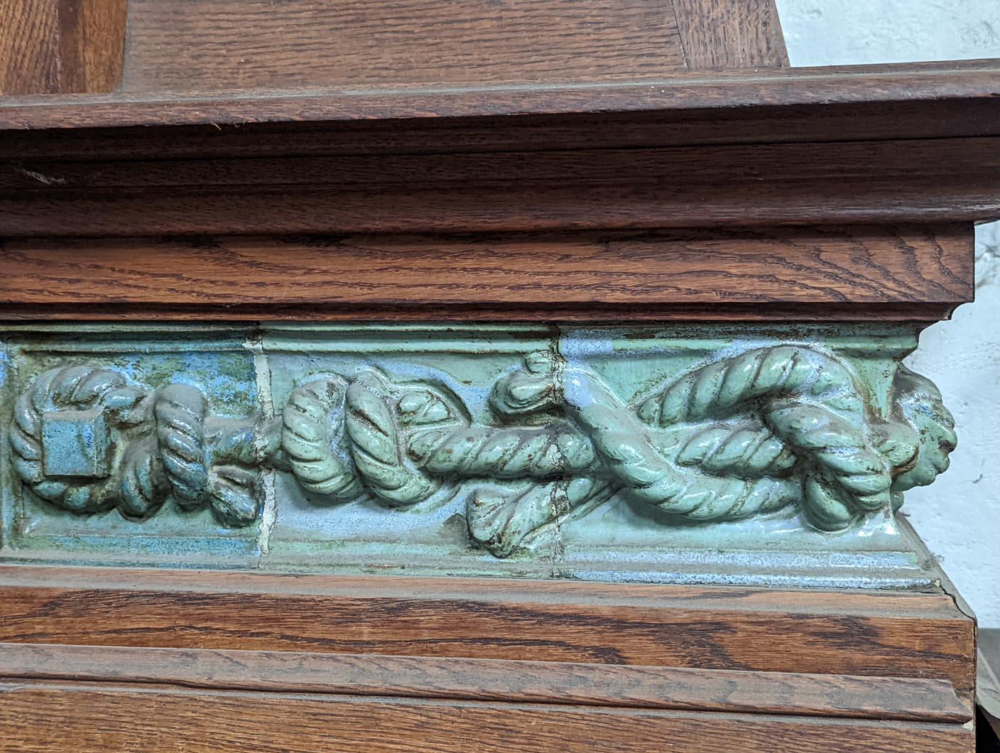 Early 20th Century GENTIL & BOURDET – Oak and Blue Stoneware Fireplace with Egyptian Revival Motifs For Sale