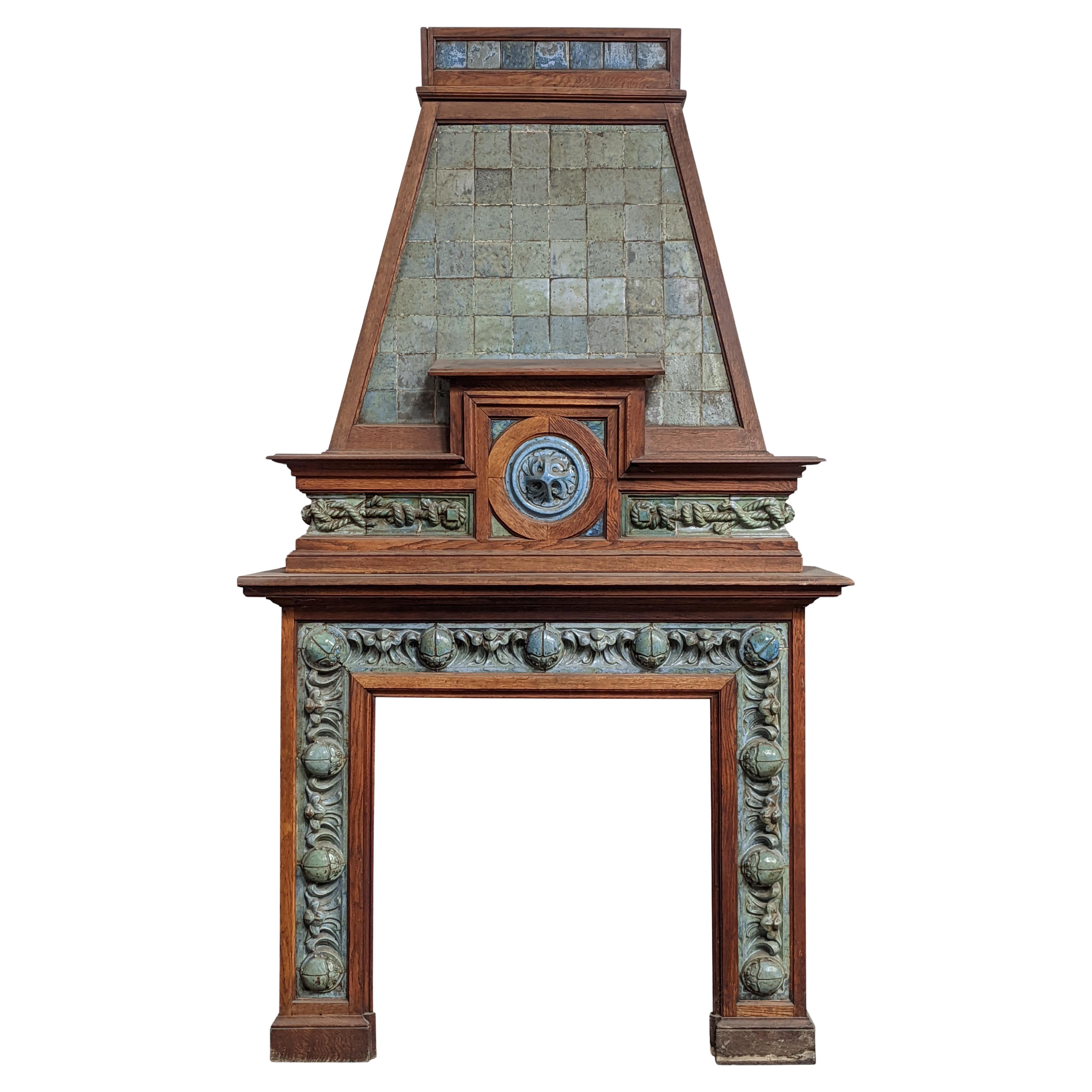 GENTIL & BOURDET – Oak and Blue Stoneware Fireplace with Egyptian Revival Motifs