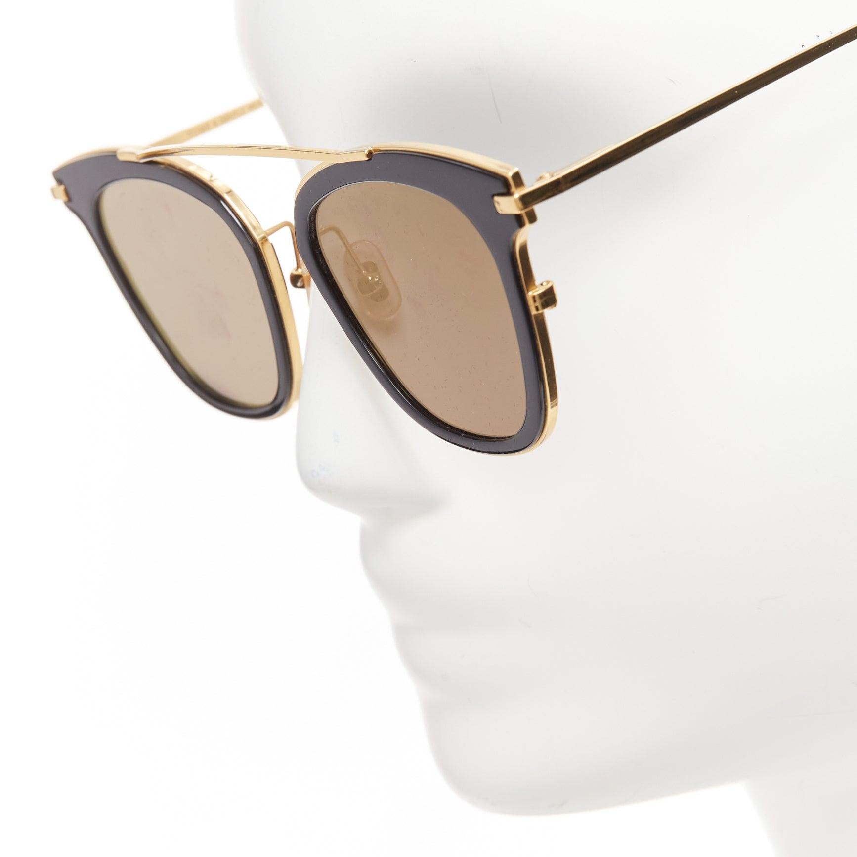 GENTLE MONSTER Moon Cuts orange marble reflective lens sunglasses
Reference: NKLL/A00076
Brand: Gentle Monster
Model: Moon cuts
Material: Plastic
Color: Orange, Black
Pattern: Abstract
Made in: China

CONDITION:
Condition: Excellent, this item was