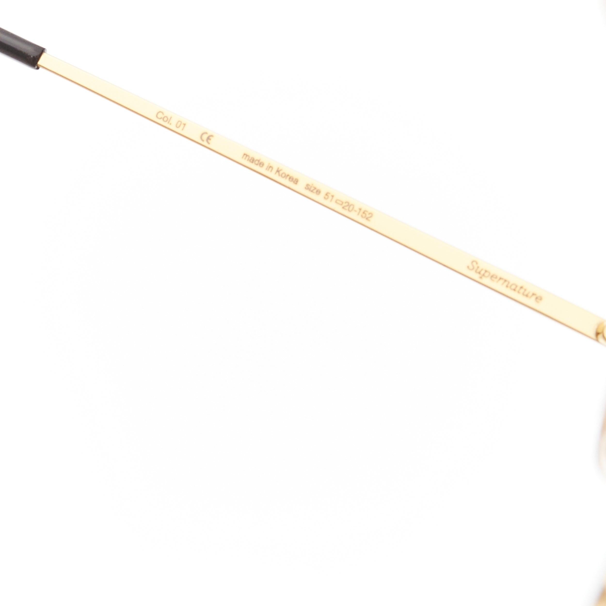 Occhiali da sole GENTLE MONSTER TOME Supernature oro nero cateye riflettente viola in vendita 4