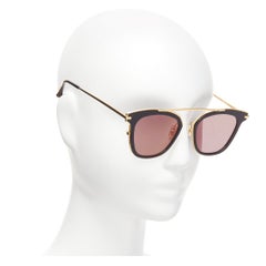 Occhiali da sole GENTLE MONSTER TOME Supernature oro nero cateye riflettente viola