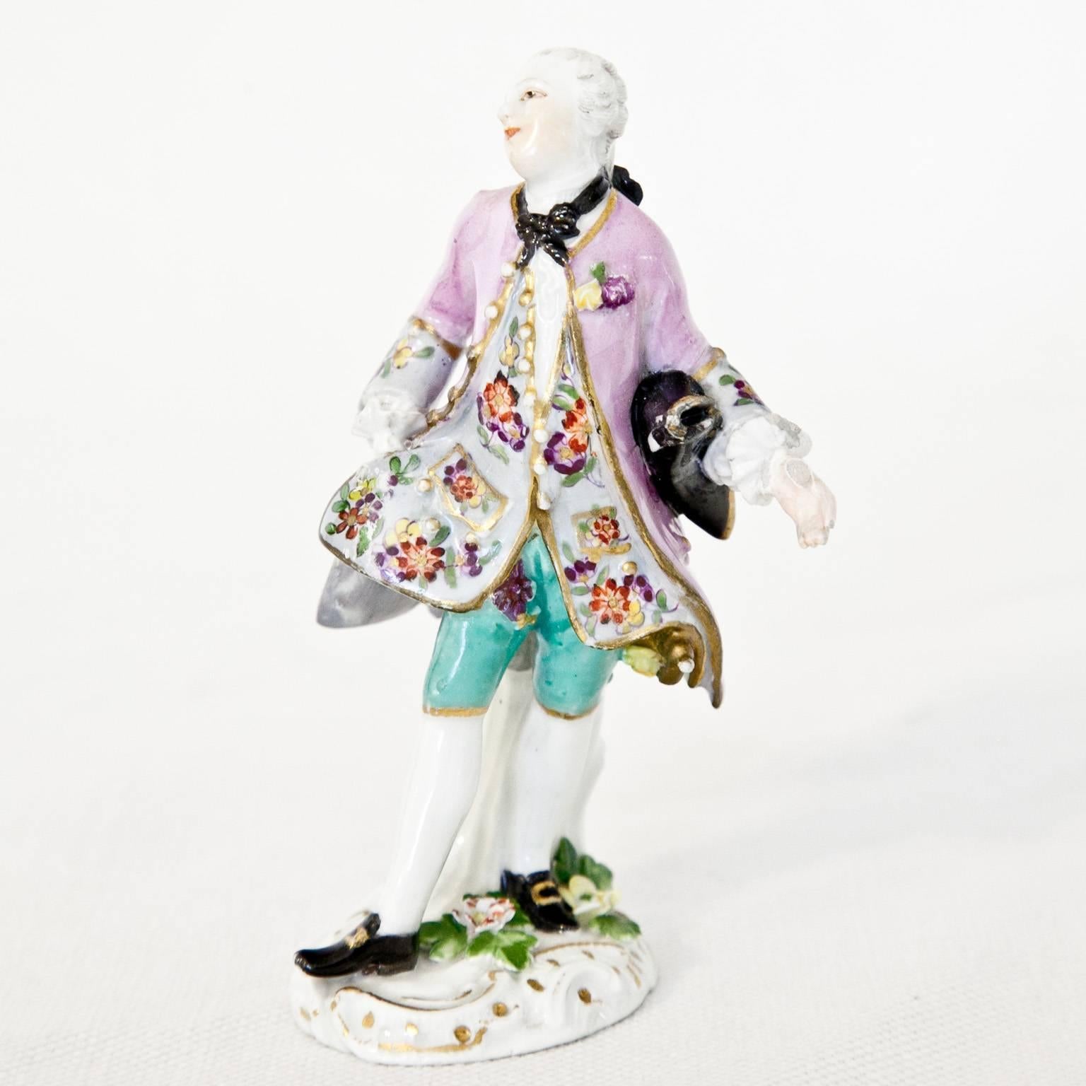Polychrome figurine of a gentleman in elegant clothes by J.J. Kaendler.
 