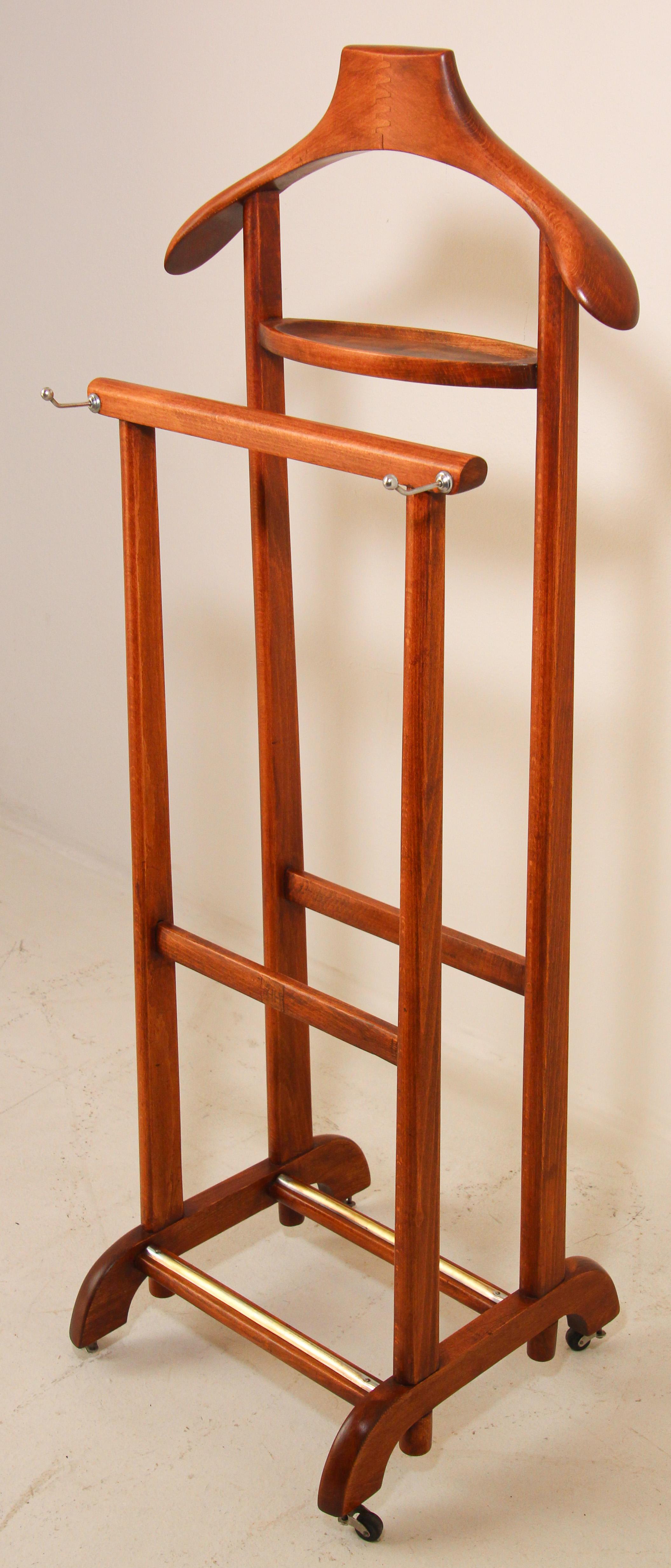 Gentleman's Double Stand Valet by Ico Parisi for Fratelli Reguitti, 1960s.
Beechwood gentleman's valet clothing stand with catch all tray change or cufflink holder and metal hooks for your neckties and belts.
There is a double rack with brass on