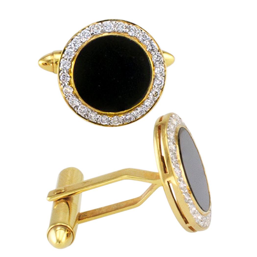 Gentleman’s black onyx and diamond dress set. Comprising a pair of cufflinks with four matching shirt studs, mounted in 18-karat yellow gold, the diamonds totaling approximately 1.43 carats, approximately G – H color and VS – SI clarity. Absolutely