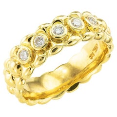 Alliance pour homme en or jaune à cinq pierres et diamants