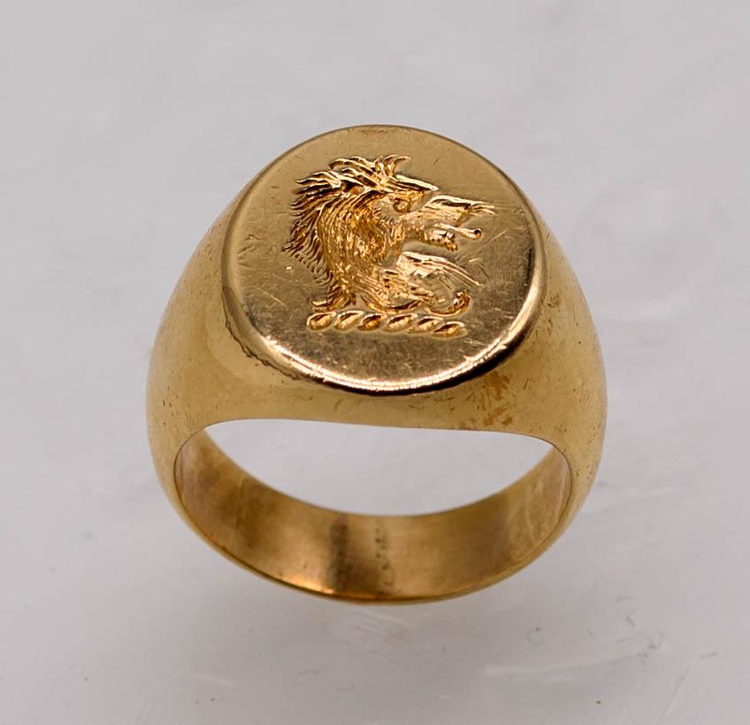 Legend dictates that a chimera has a fire-breathing lion's head, a goat's body, and a serpent's tail; all we see here, though, is the creature's beautifully detailed head engraved deeply into the  jewel's gold base.   Perfectly suitable as your own
