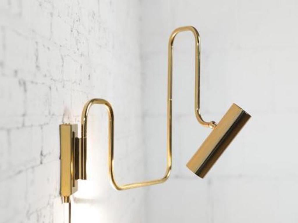 The Pivot LED Series with its articulated arm and adjustable head this brass LED lamp, is not only multidimensional, but it is an ever changing line drawing that nestles into a room. Reminiscent of Industrial piping, the warmth of the refined