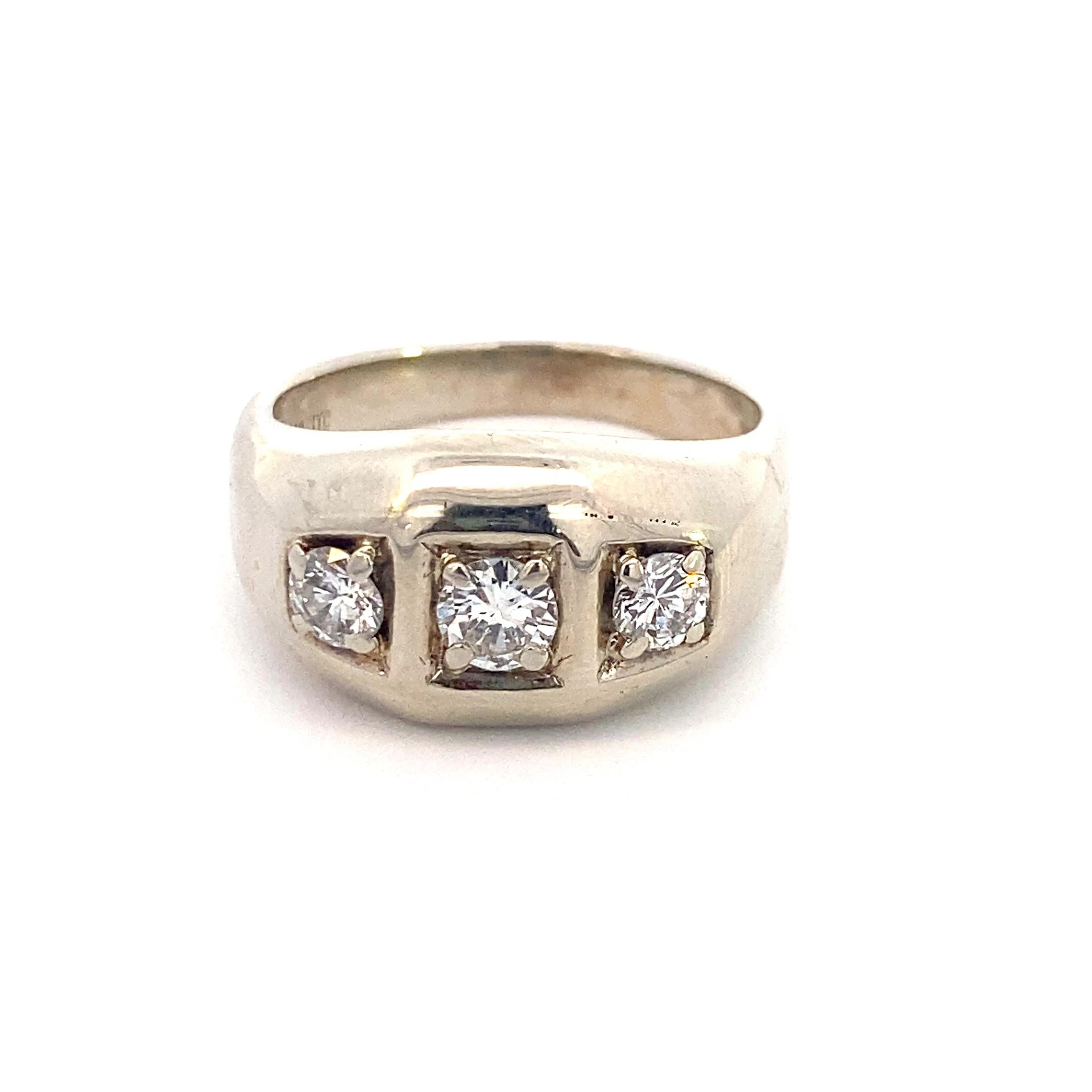 This is a gentlemen's ring. It has 3 beautiful diamonds and is white gold. It is 14K white gold to be more specific and is a size 11.25. The main diamond size is a .50 and the side diamonds are .25. Making this rings total carat weight 1. The total