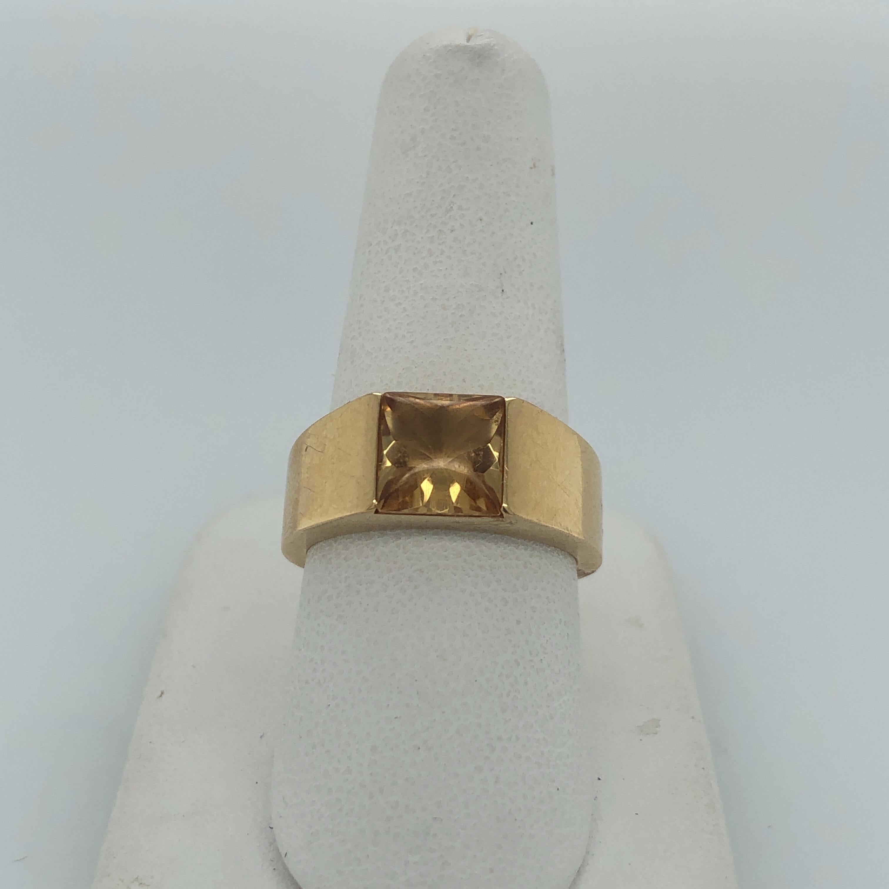 Gents 18K Yellow Gold CARTIER Citrine Ring; center 8mm square cabochon cut natural center stone is half bezel set in a simple classic design.  Inside ring features manufacturer's marks: 58 CARTIER 1997 750 Cartier AC 0263 and trademark stamp