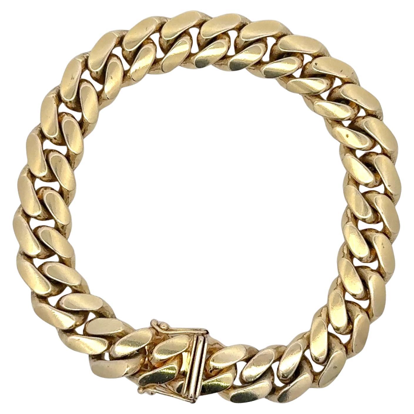 Bracelet homme en or jaune 14 carats à maillons cubains pesant 61,3 grammes. Plus de chaînes et colliers cubains en stock. 
Longueur 8.13
