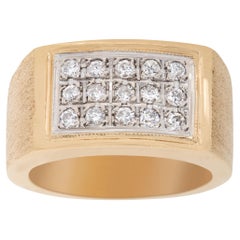 Gents solid diamond ring in 14k yellow gold.  0.70 carats in diamonds. 