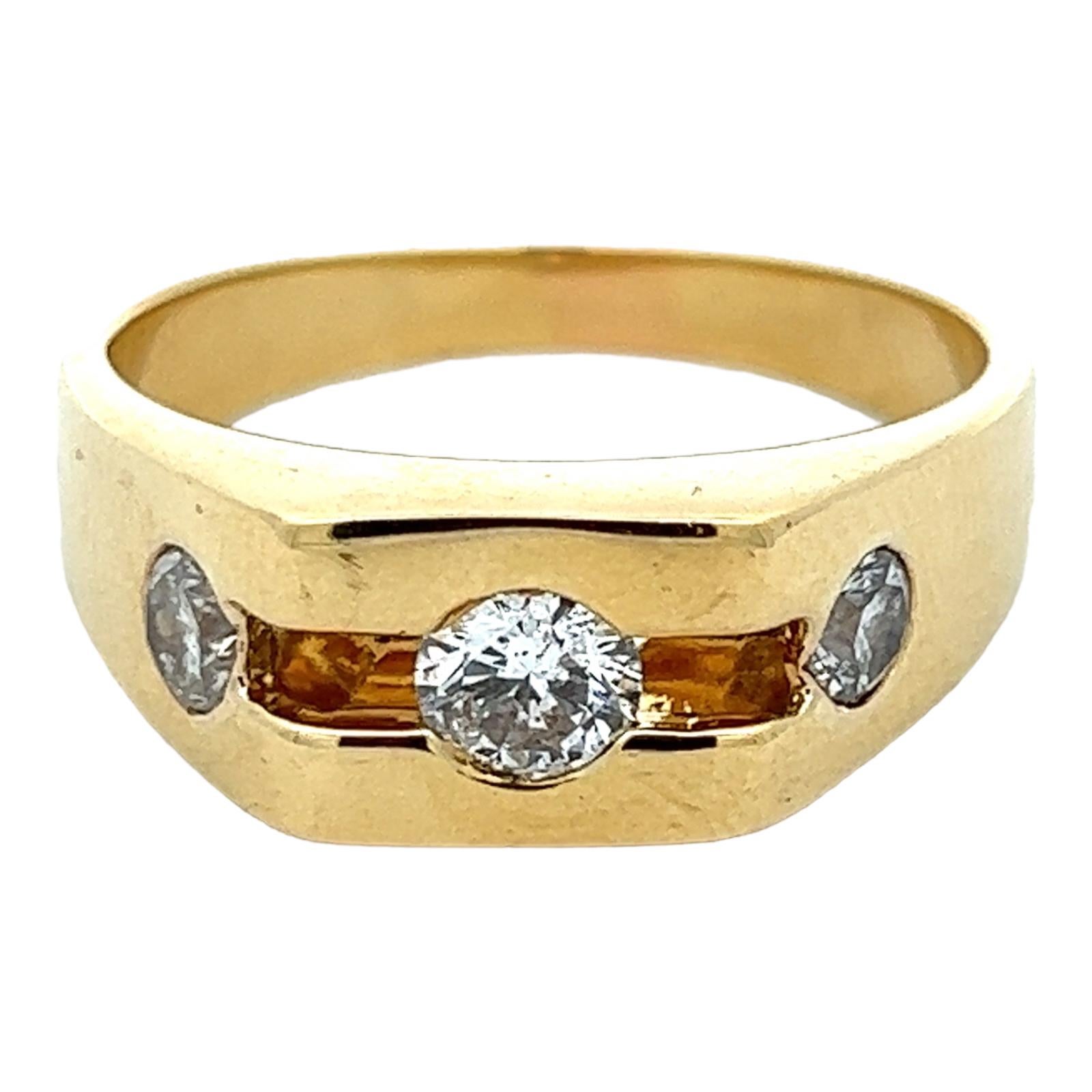 Gents three diamond wedding band ring handcrafted in 18 karat yellow gold. The band features 3 round briliant cut diamonds weighing approximately 1.00 CTW (the center is .50 CT and the two sides .50 CTW). The diamonds are graded G-H color and SI