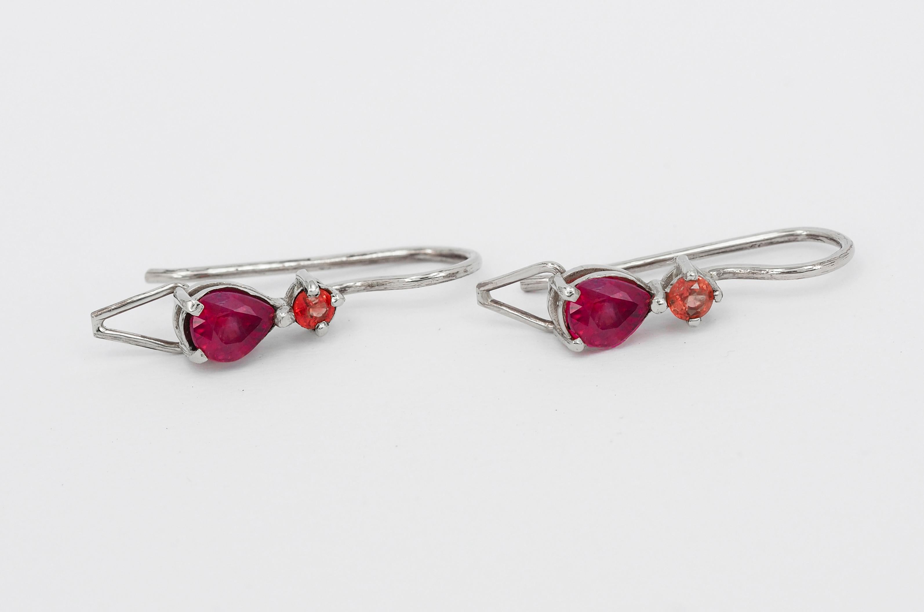 Pear Cut Genuine 1 ct rubies and sapphires earrings.  For Sale