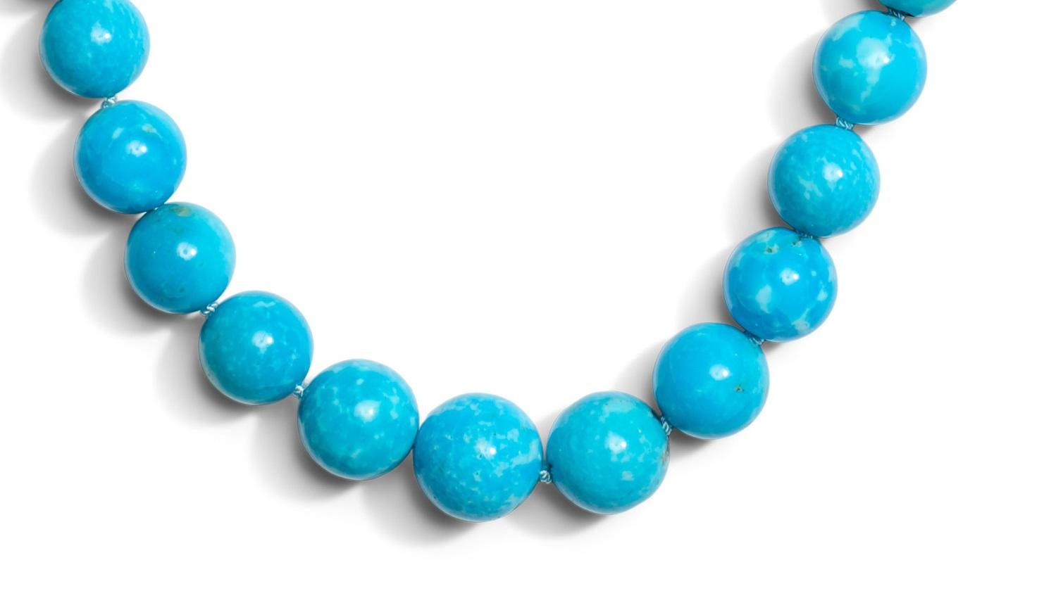 A regal 18.5 inch long handcrafted one of a kind necklace, with extremely rare and pure Sleeping Beauty Turquoises. This necklace features genuine high grade genuine turquoises from the sleeping beauty mine, delicately strung together with a