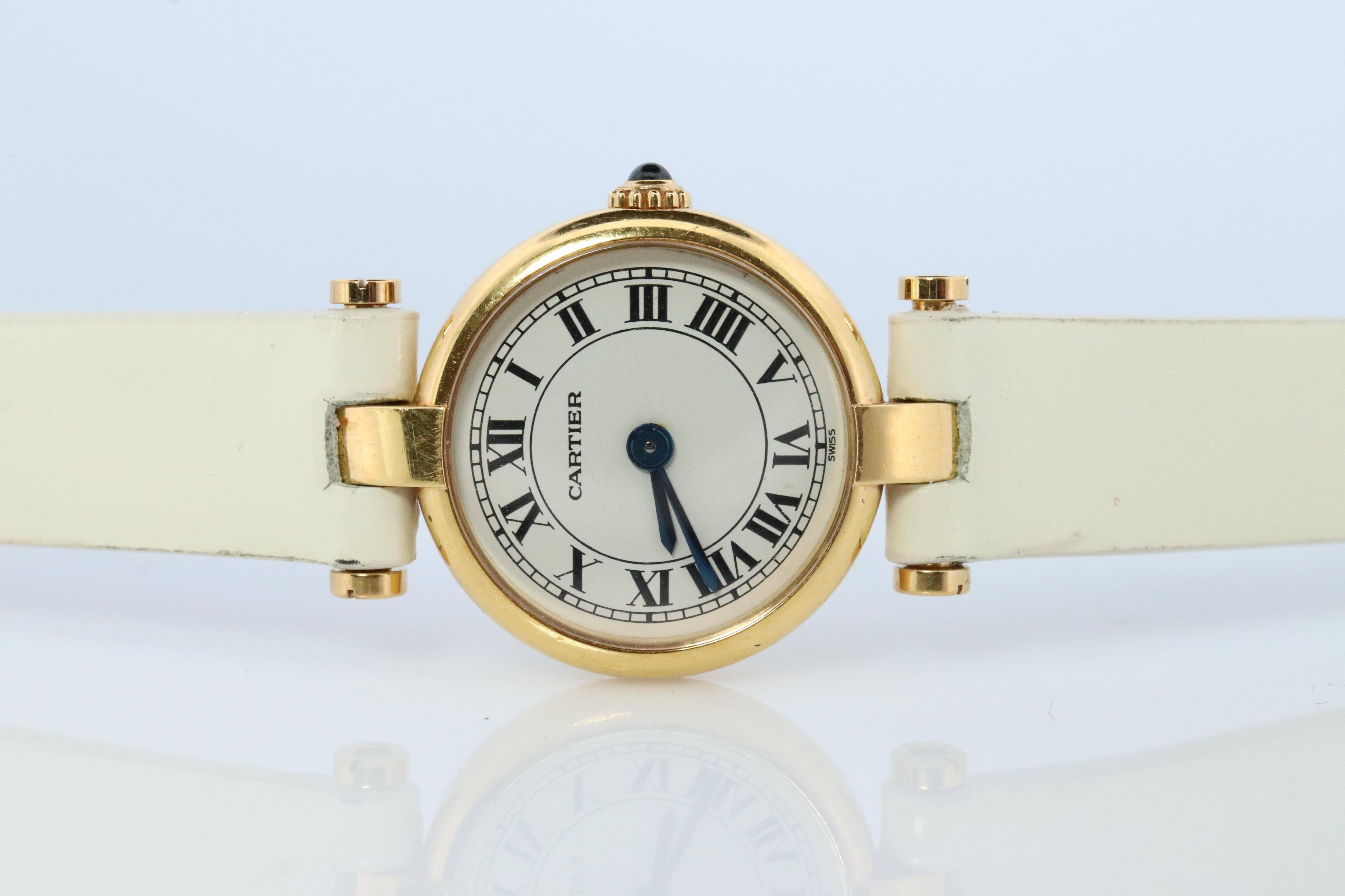 Genuine Cartier watch. 

18k Solid Gold Case.

Mini Vendome 2163

White Face

Condition: Comes with Original case . 

New battery installed.
New genuine leather strap.

Details:
20mm Round case