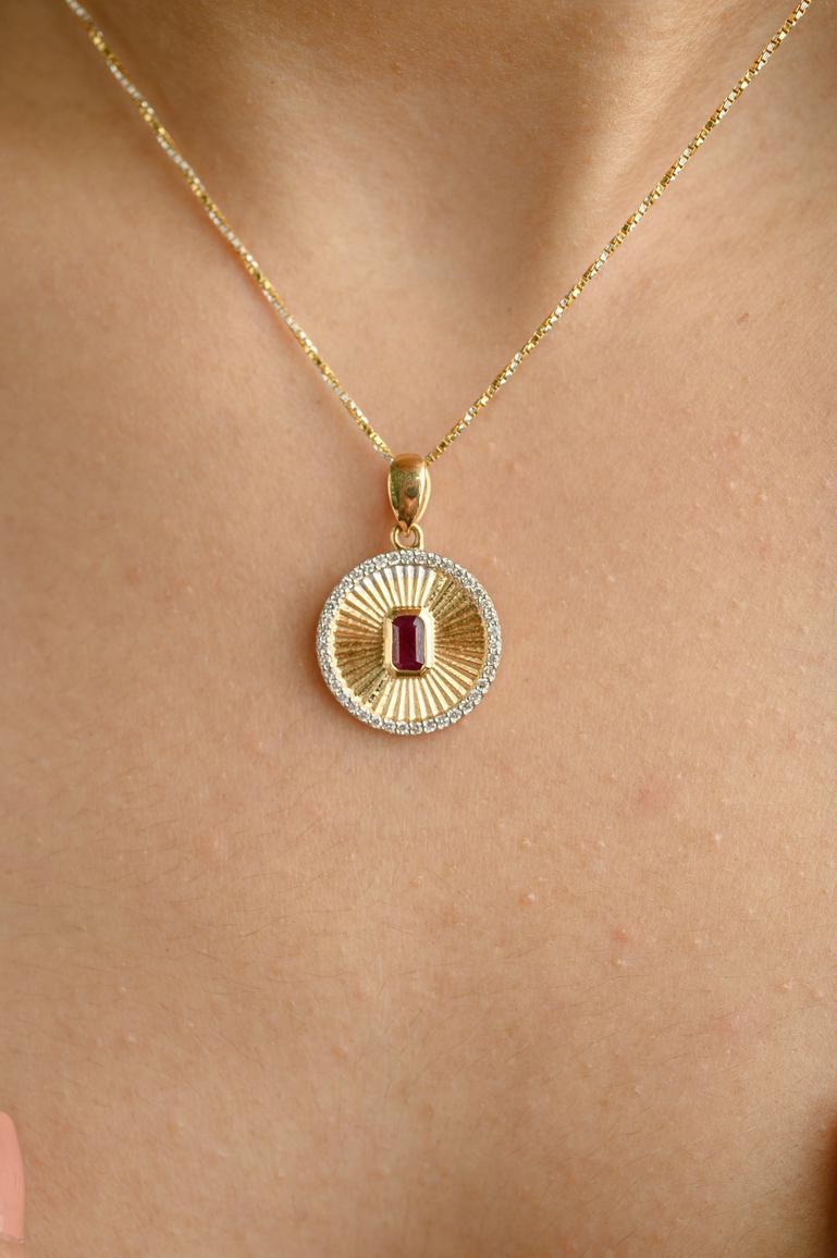Ruby Medallion Charm Pendant in 18K Gold studded with octagon cut ruby. This stunning piece of jewelry instantly elevates a casual look or dressy outfit. 
Ruby improves mental strength. 
Designed with octagon cut ruby studded between the striped