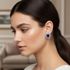 Autentici orecchini a perno con diamante e zaffiro blu ovale da 2,05 CTW in oro bianco 14k