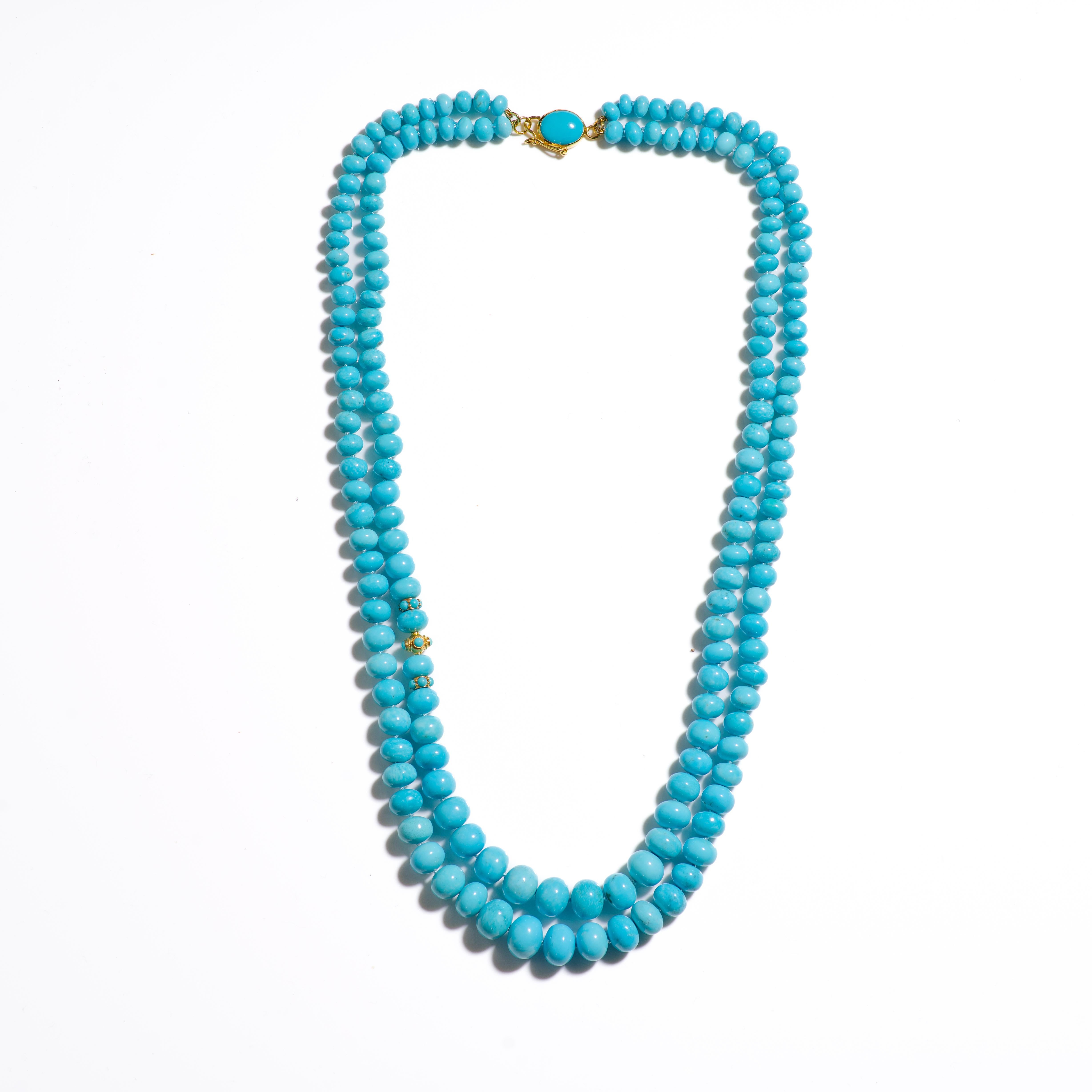 A regal double layered 22 inch long handcrafted necklace with extremely rare and pure Sleeping Beauty Turquoises. This necklace features genuine high grade Robinson Egg Blue turquoises from the sleeping beauty mine in Arizona, delicately strung