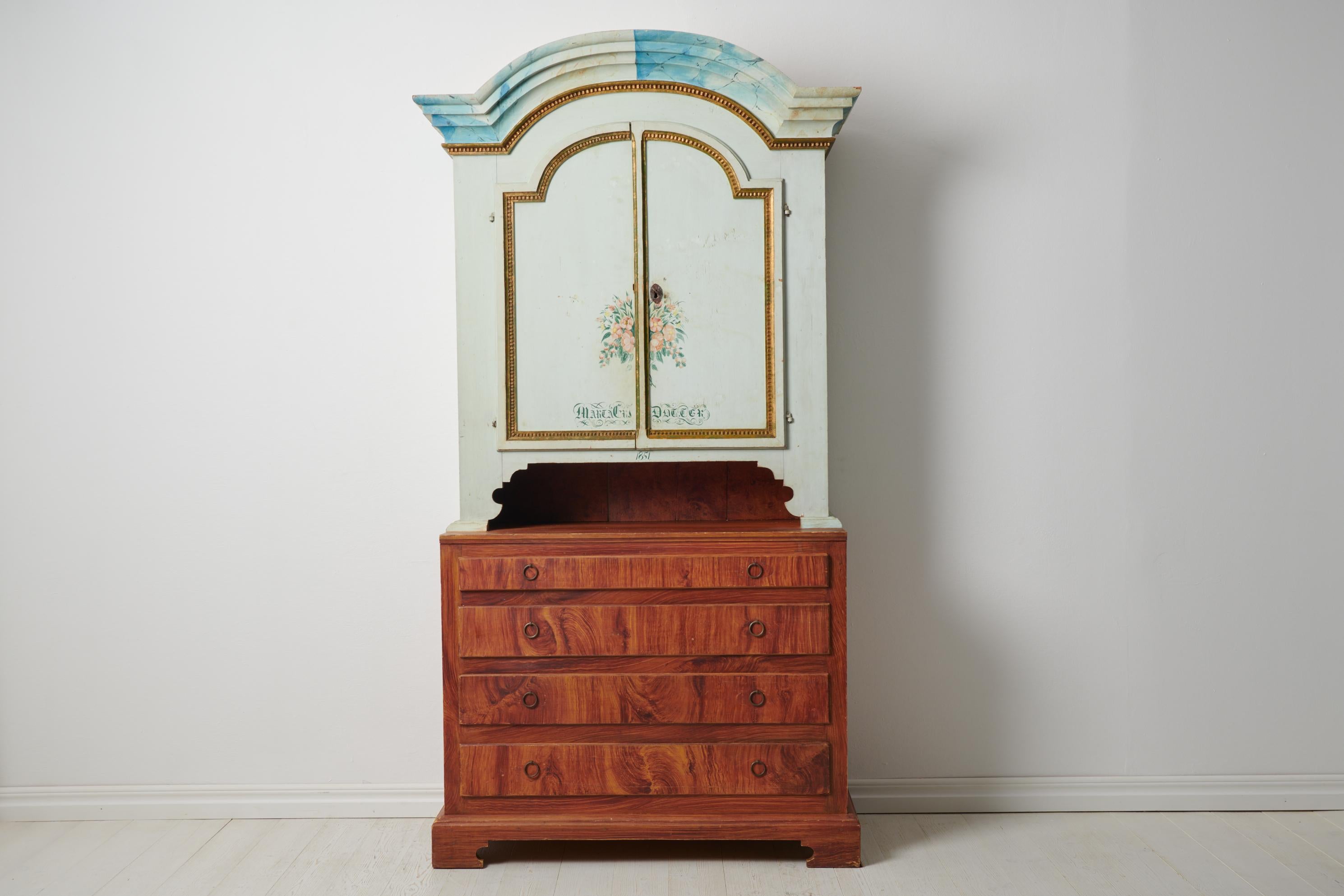 Genuine country rococo cabinet from northern Sweden dated 1851. Elevate your space with the timeless charm of this genuine country rococo cabinet from northern Sweden, a true treasure dating back to the mid 1800s. Hailing from the picturesque