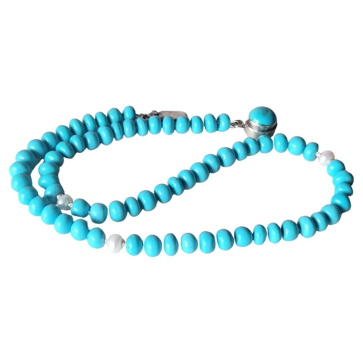 Who wears pearl necklaces?