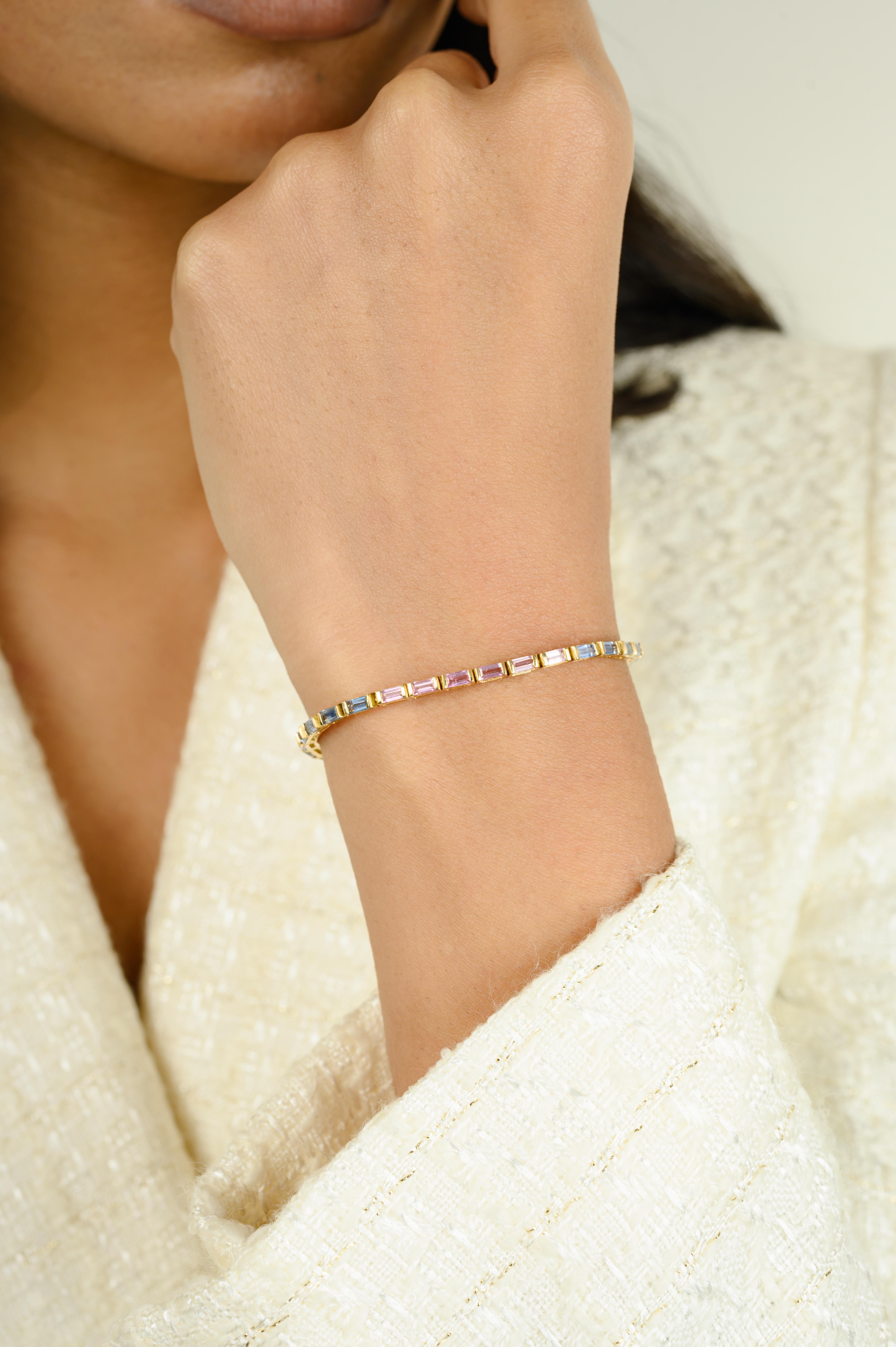 This Genuine Baguette Multi Sapphire Tennis Bracelet in 18k Solid Yellow Gold endlessly sparkling natural multi sapphires, weighing 5.1 carats. It measures 6.5 inches long in length. 
Sapphire stimulate concentration and reduces stress.
Designed