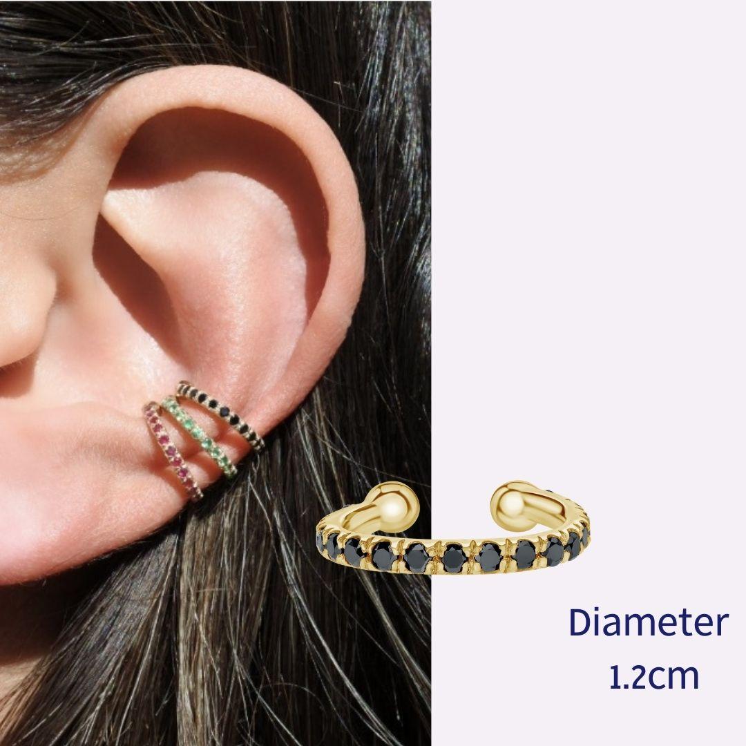 Genuine Black Diamond Helix Cuff Earring in 14K Yellow Gold, Shlomit Rogel

Minimalist 14k yellow solid gold ear cuff set with 18 high quality natural black diamonds.
This beautifully handcrafted ear cuff will upgrade your everyday style and sparkle