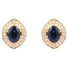 Genuine Blue Sapphire and Diamond Halo Stud Earrings in 18K Yellow Gold