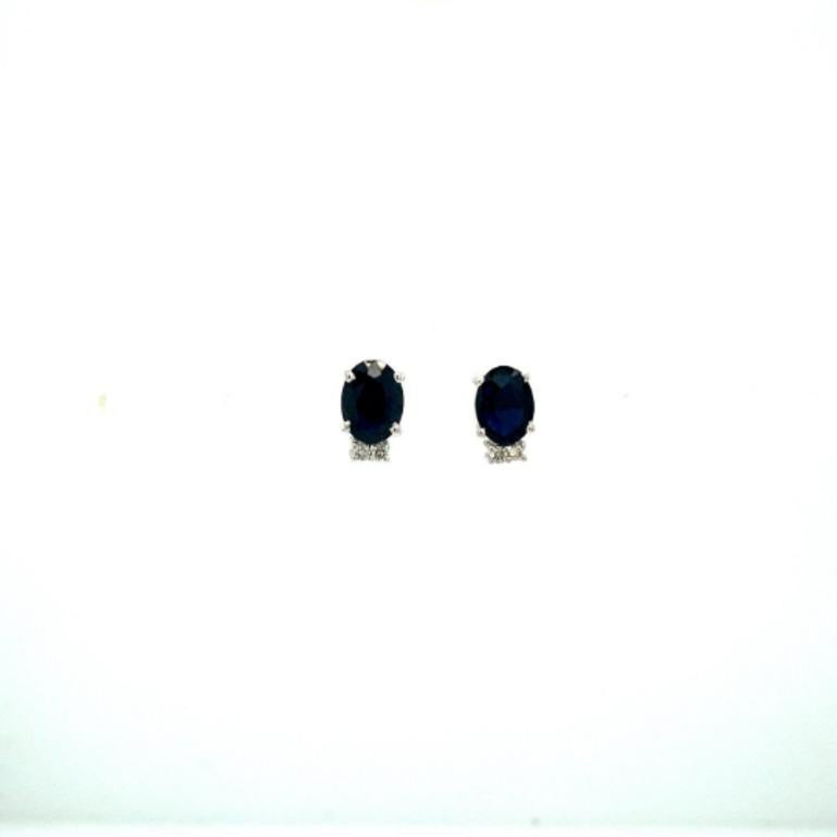 Genuine Blue Sapphire Diamond Stud Earrings in sterling silver to make a statement with your look. You shall need stud earrings to make a statement with your look. These earrings create a sparkling, luxurious look featuring oval cut natural blue