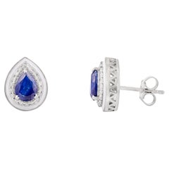 Ohrstecker in Birnenform aus 14 Karat Weißgold mit echtem blauem Saphir, Halo und Diamant in Tropfenform