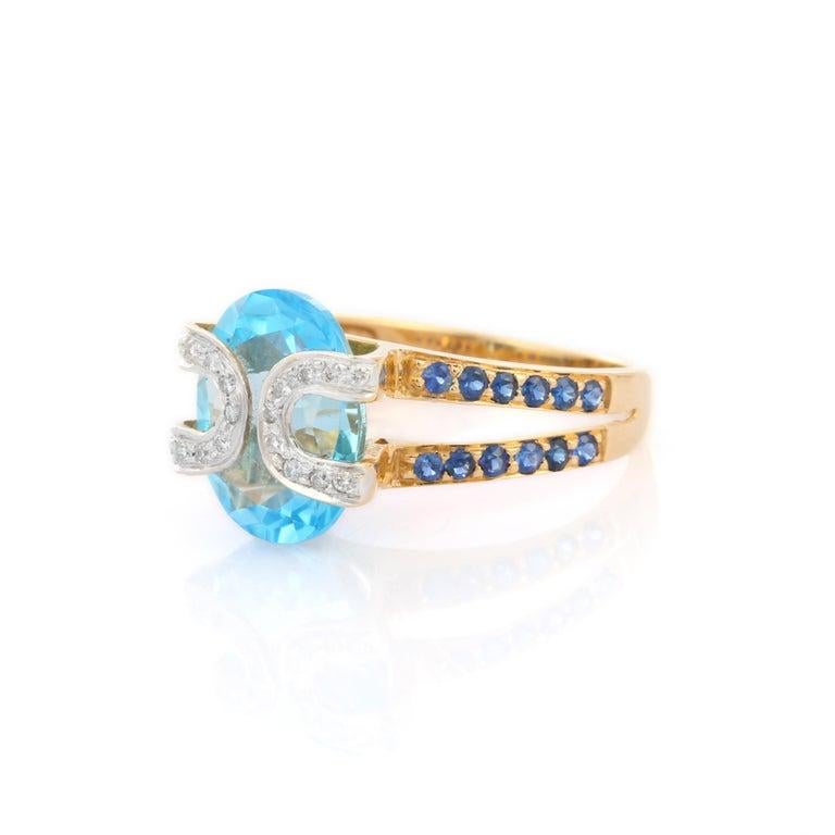 For Sale:  Genuine Blue Topaz Cocktail Ring with Sapphire and Diamonds in 18k Yellow Gold 3