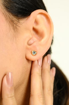 Genuine Blue Topaz Heart Shape Stud Earrings in 14k Yellow Gold for Women