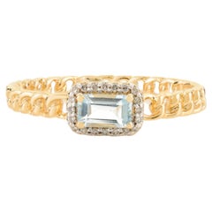 Verlobungsring aus 14 Karat Gelbgold mit echtem blauem Topas und Halo-Diamanten