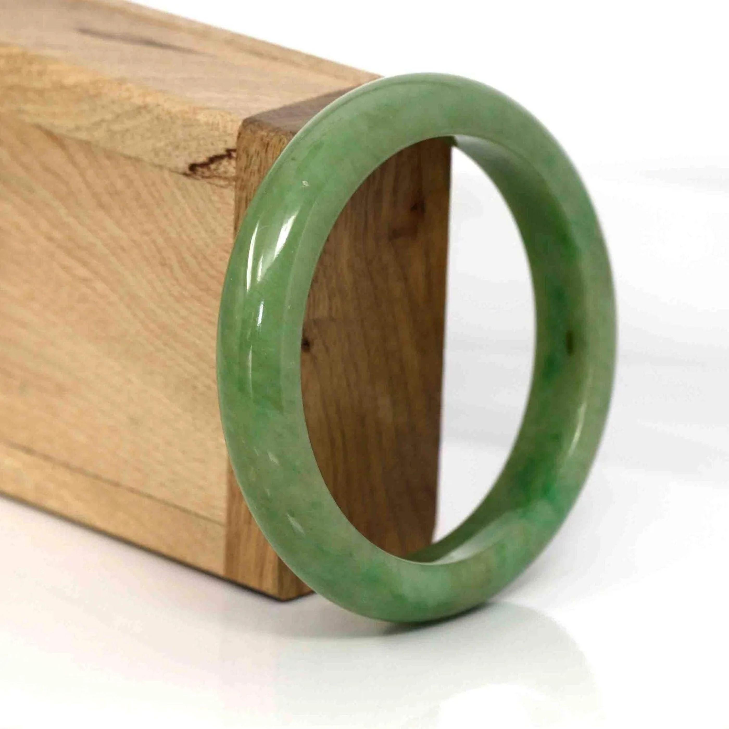 * * DETAILS---This bangle is made with Burmese yellow-green jadeite jade. This bangle is made with very fine texture from old mine. The jade texture is very smooth, with part of the green color and yellowish.  It's a very unique bangle with a