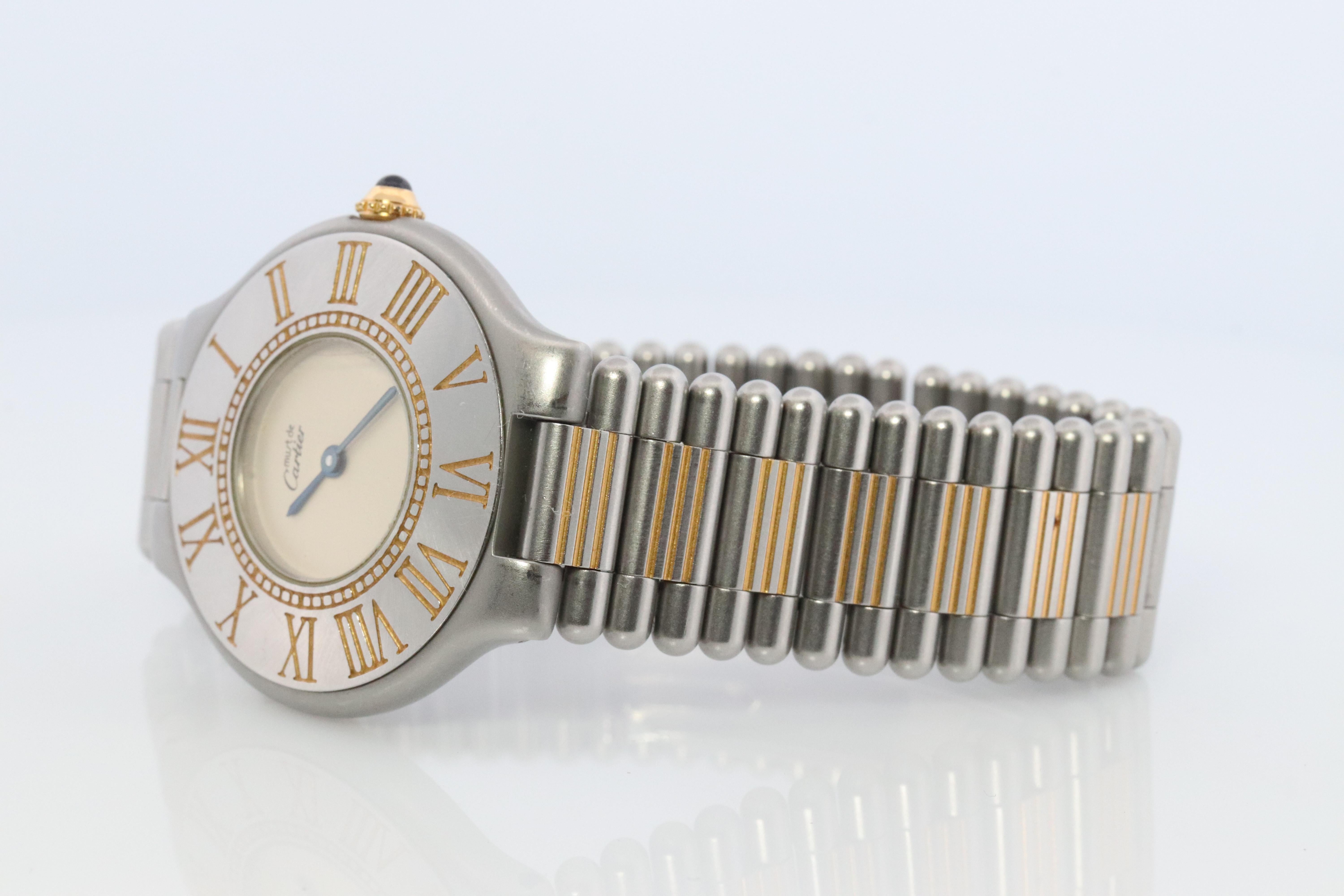 Genuine Cartier watch. Vintage Must de Cartier 21

B01952 Reference number.
Condition: New Battery. Just Serviced.

Details:
31mm round Case

6.5inches wrist
