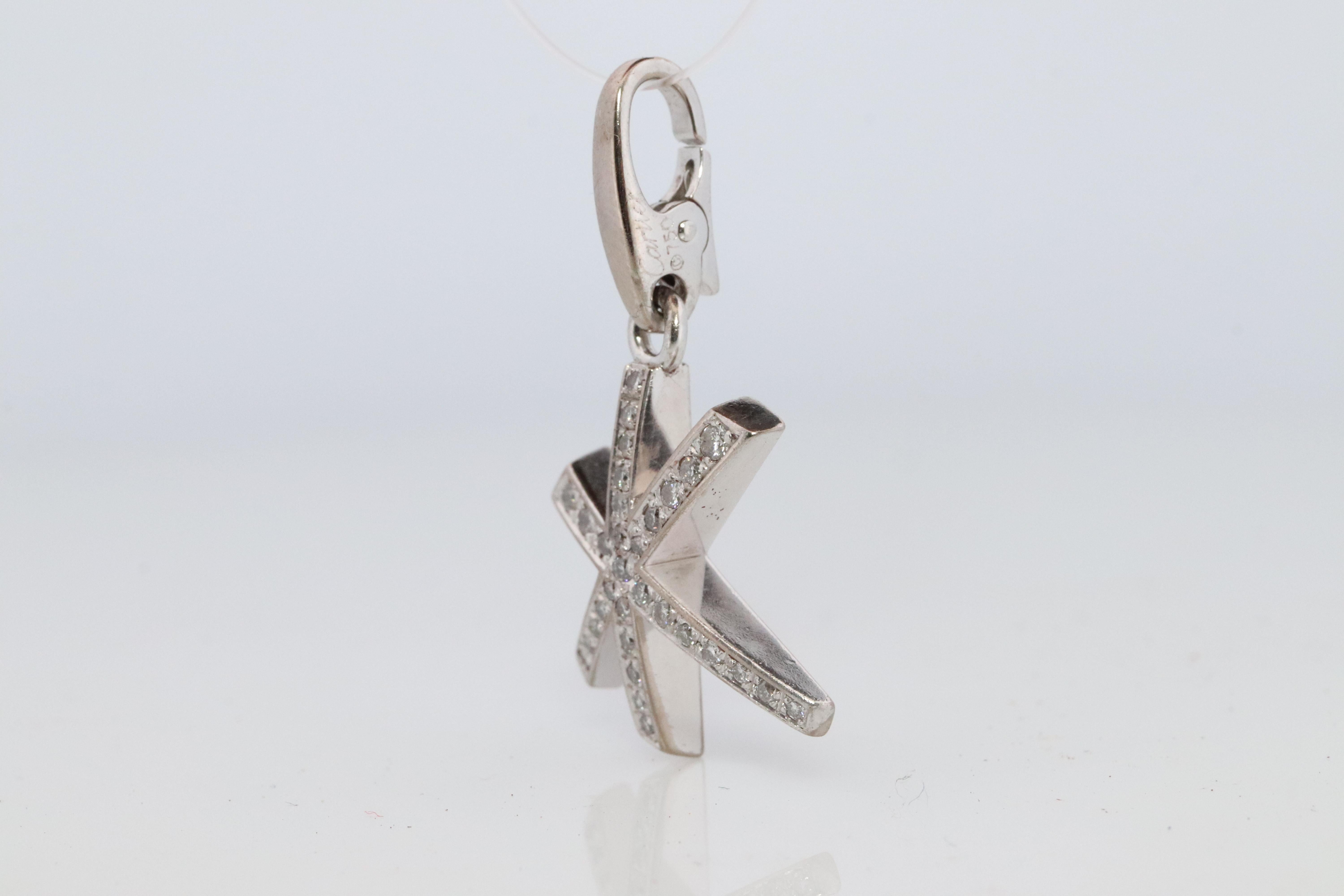 Genuine Cartier Firework Pendant. 18k White Gold Diamond Cartier Fireworks Charm In Good Condition In Port Charlotte, FL